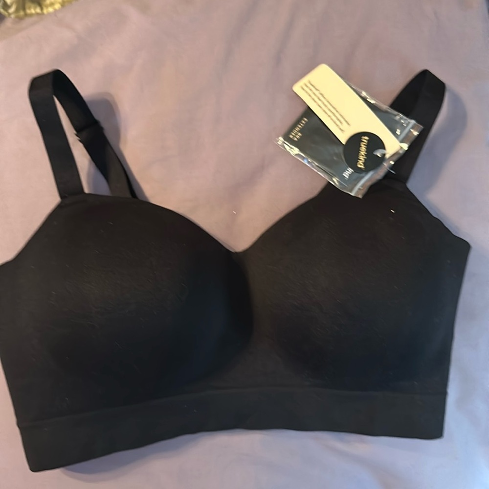 Brand new with tags wire free bra. Includes extender.